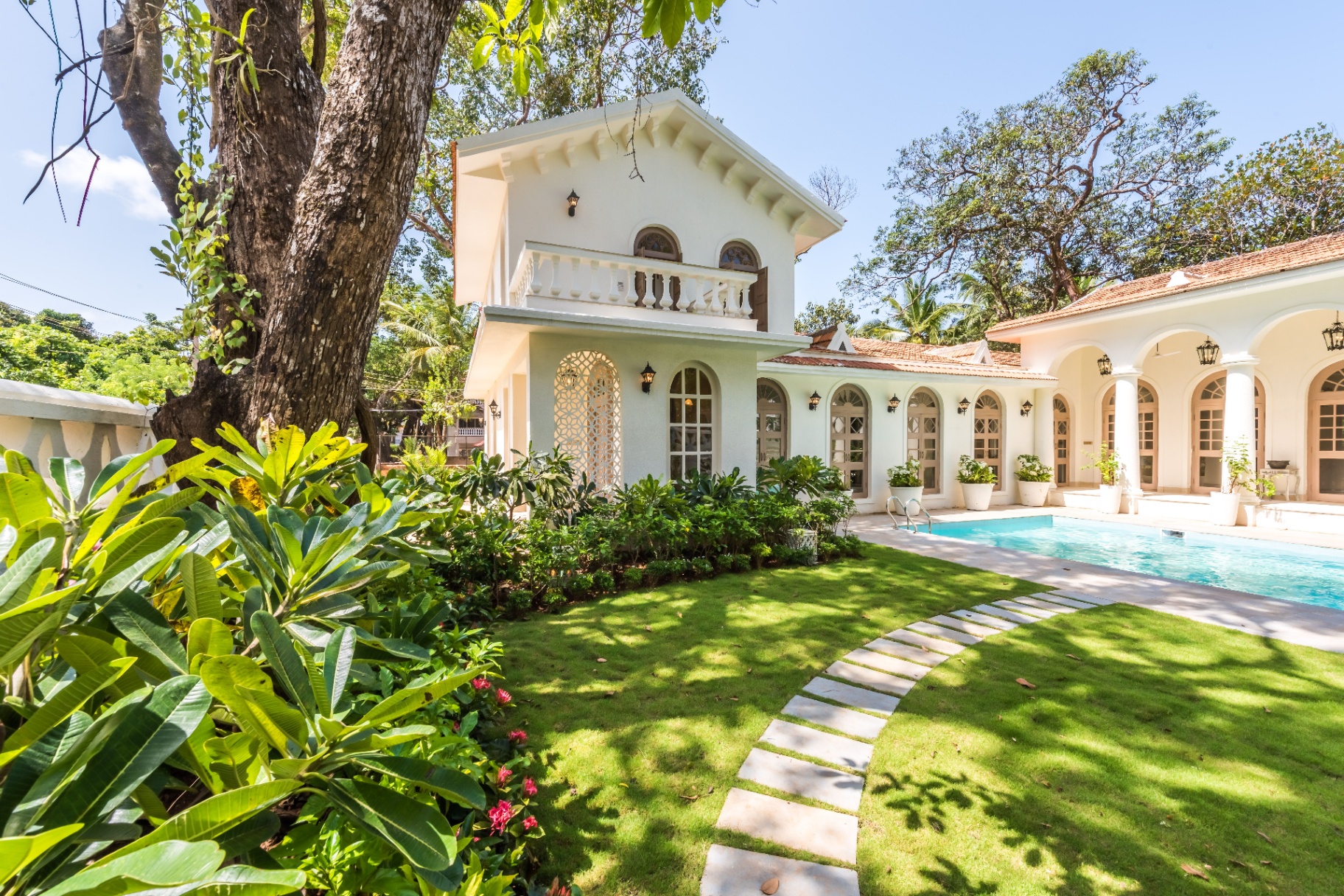 A sunlit villa terrace, representing Houfy’s vacation rental blog content